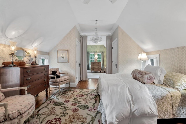 37 Tobisset St, Mashpee, MA 02649 - bedroom featuring wallpapered walls, wood finished floors, vaulted ceiling, and a chandelier