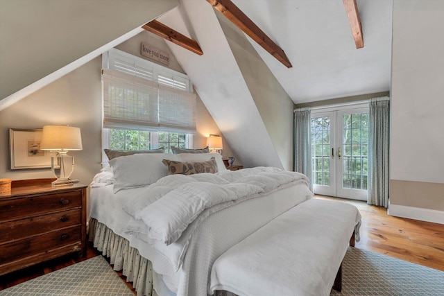 37 Tobisset St, Mashpee, MA 02649 - bedroom featuring access to outside, wood finished floors, multiple windows, and french doors