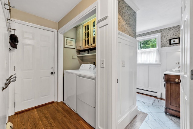 37 Tobisset St, Mashpee, MA 02649 - laundry room featuring a baseboard radiator, independent washer and dryer, cabinet space, a wainscoted wall, and wallpapered walls
