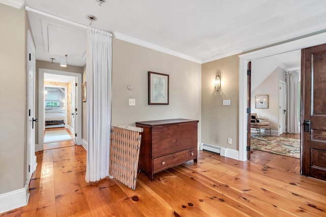 37 Tobisset St, Mashpee, MA 02649 - hallway featuring light wood finished floors, baseboard heating, and crown molding