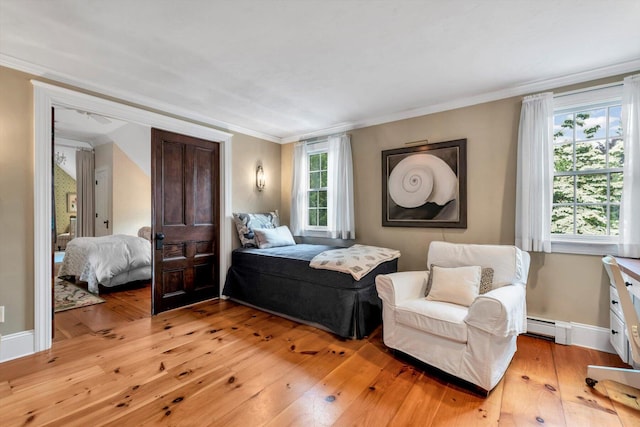 37 Tobisset St, Mashpee, MA 02649 - bedroom with a baseboard radiator, light wood-style flooring, and crown molding