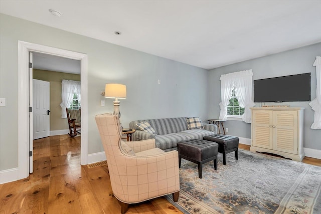 37 Tobisset St, Mashpee, MA 02649 - living area with light wood-style flooring and baseboards