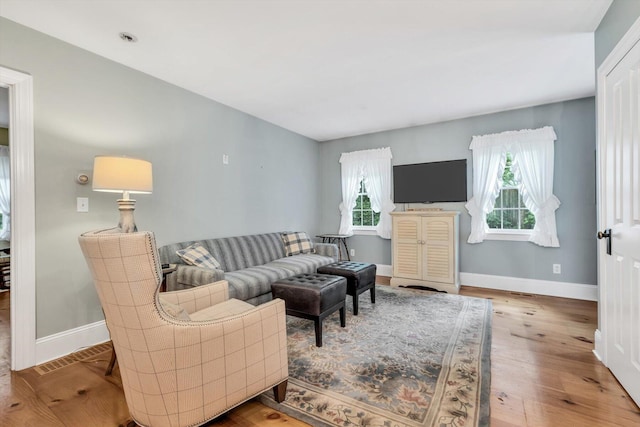 37 Tobisset St, Mashpee, MA 02649 - living room featuring baseboards and wood finished floors