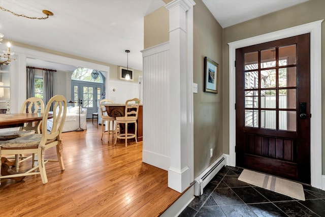 37 Tobisset St, Mashpee, MA 02649 - entrance foyer featuring a baseboard heating unit and french doors