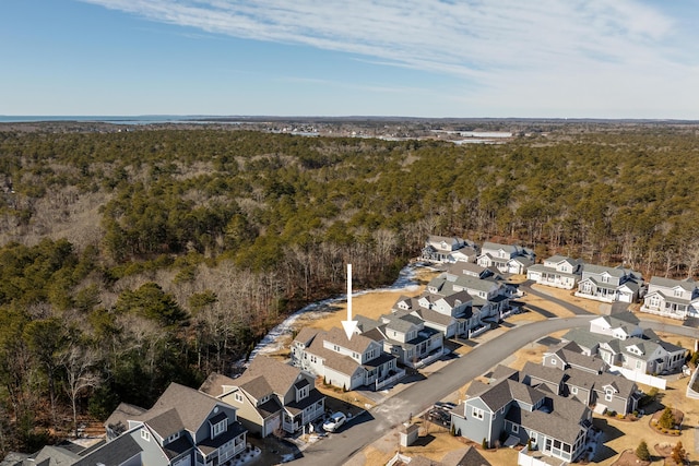 bird's eye view featuring a residential view and a view of trees