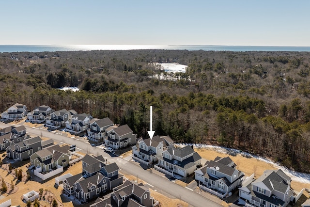 bird's eye view featuring a residential view and a view of trees