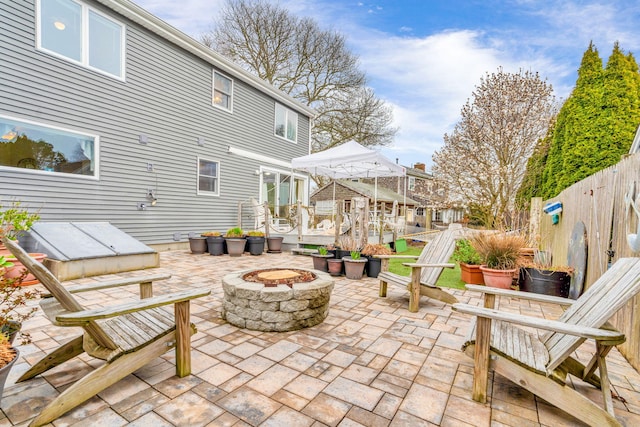 69 Reynolds St, Teaticket, MA 02536 - view of patio with an outdoor fire pit