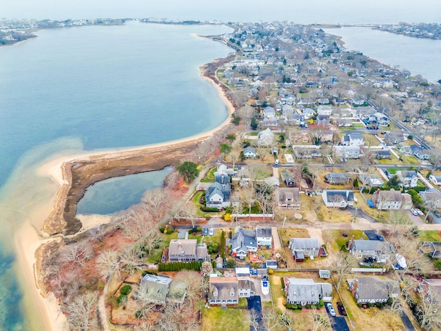 birds eye view of property featuring a residential view and a water view