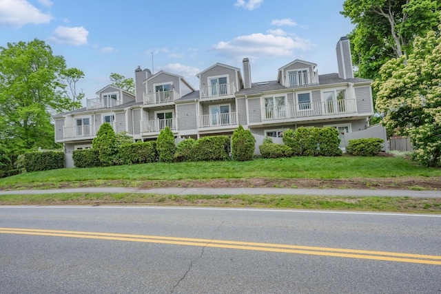 925 Main St Unit 3, Cotuit, MA 02635 - shingle-style home with a chimney and a balcony