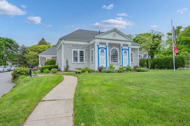 925 Main St Unit 3, Cotuit, MA 02635 - view of front facade with a front yard and roof with shingles