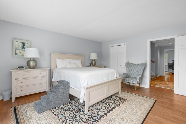 925 Main St Unit 3, Cotuit, MA 02635 - bedroom with light wood finished floors, a closet, and baseboards