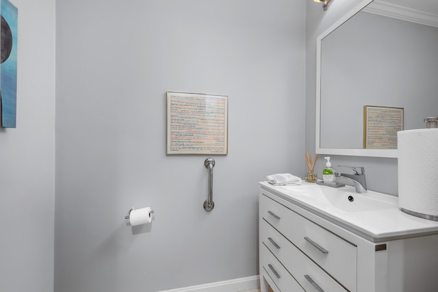 925 Main St Unit 3, Cotuit, MA 02635 - bathroom featuring vanity, crown molding, and baseboards