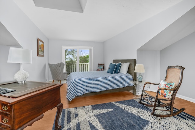 925 Main St Unit 3, Cotuit, MA 02635 - bedroom with wood finished floors, access to exterior, and baseboards