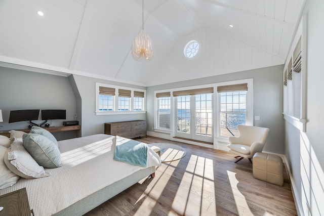 bedroom with wood ceiling, vaulted ceiling with beams, a notable chandelier, and hardwood / wood-style floors