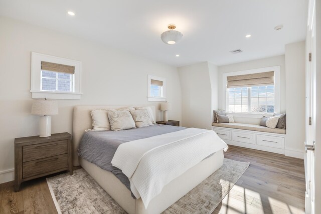 bedroom with light wood-type flooring