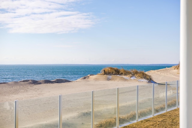 property view of water featuring a beach view