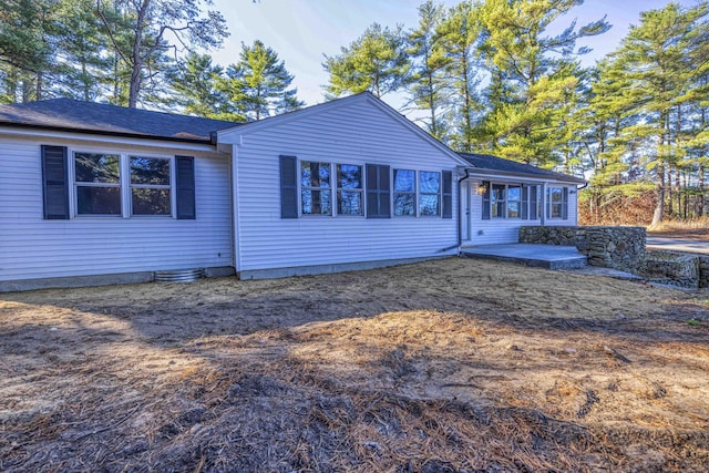 back of property featuring a patio