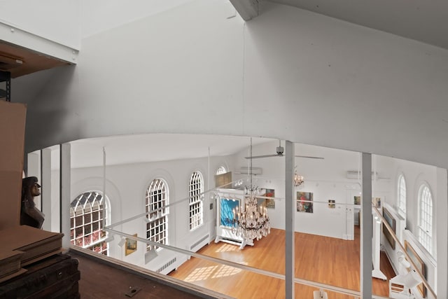 interior details with a chandelier and wood-type flooring