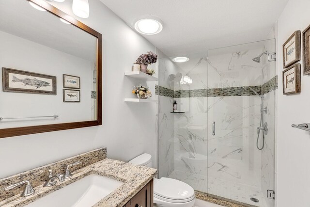 95 Red Brook Rd, Waquoit, MA 02536 - bathroom with a marble finish shower, toilet, and vanity