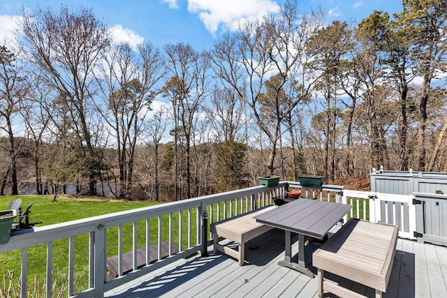 95 Red Brook Rd, Waquoit, MA 02536 - wooden deck featuring outdoor dining space and a lawn
