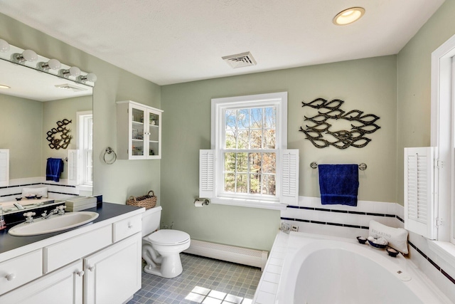 95 Red Brook Rd, Waquoit, MA 02536 - bathroom featuring vanity, tile patterned floors, a bath, visible vents, and a baseboard radiator