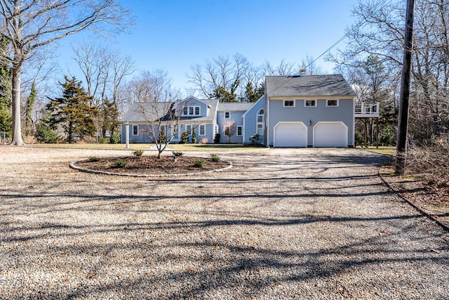 view of front of house with a garage and driveway