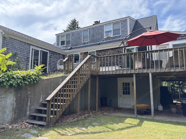 2 Shell Ln, Orleans, MA 02653 - back of house featuring a deck, stairs, a shingled roof, and a yard