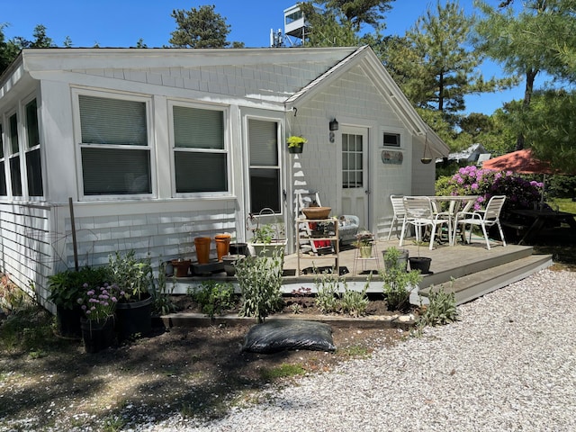 view of front of house with a deck