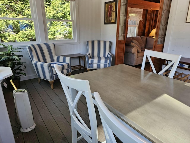 dining room with hardwood / wood-style flooring