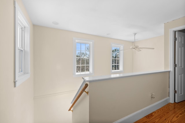 69 Upper County Rd, South Dennis, MA 02660 - hall with wood finished floors and an upstairs landing