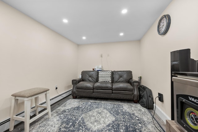 69 Upper County Rd, South Dennis, MA 02660 - living room featuring recessed lighting, wood finished floors, and a baseboard heating unit