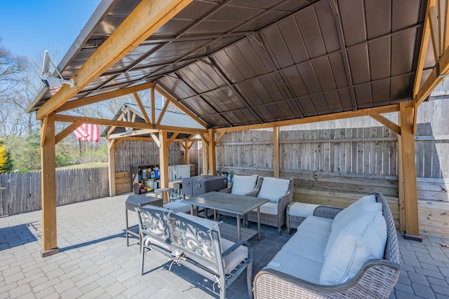 69 Upper County Rd, South Dennis, MA 02660 - fenced backyard with a gazebo, a patio, and outdoor lounge area