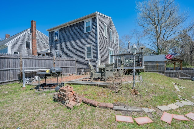 69 Upper County Rd, South Dennis, MA 02660 - back of property featuring a deck and a fenced backyard
