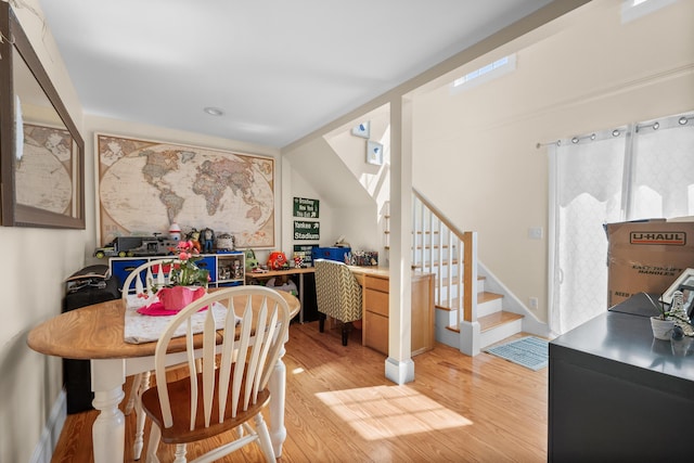 69 Upper County Rd, South Dennis, MA 02660 - dining room with light wood-style flooring and stairs