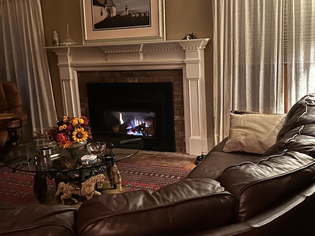 11 Polaris Dr, Mashpee, MA 02649 - detailed view of a warm lit fireplace