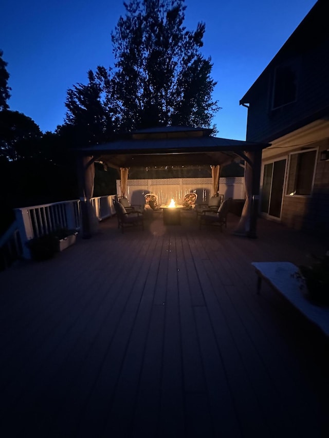 11 Polaris Dr, Mashpee, MA 02649 - wooden terrace with an outdoor fire pit