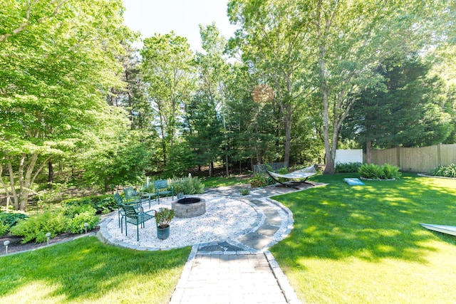11 Polaris Dr, Mashpee, MA 02649 - view of yard featuring an outdoor fire pit