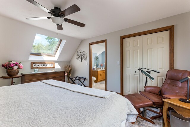 11 Polaris Dr, Mashpee, MA 02649 - bedroom featuring a skylight, a closet, connected bathroom, lofted ceiling, and a ceiling fan