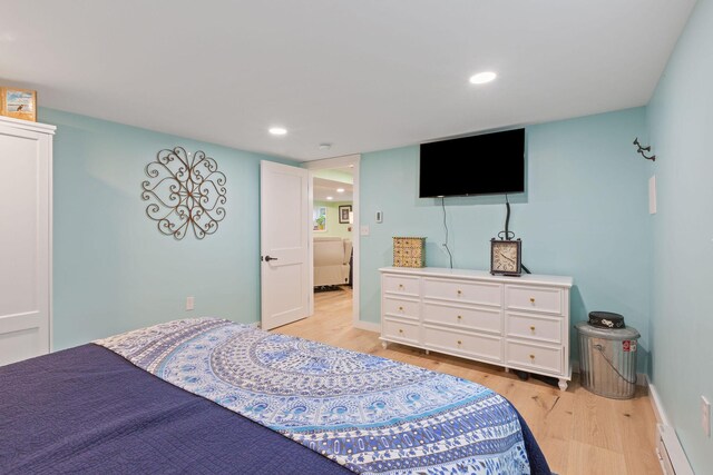 bedroom featuring light wood-type flooring