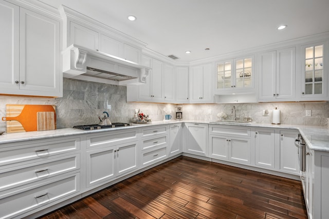 595 Main St Unit 37, Chatham, MA 02633 - kitchen with white cabinets, glass insert cabinets, backsplash, and recessed lighting