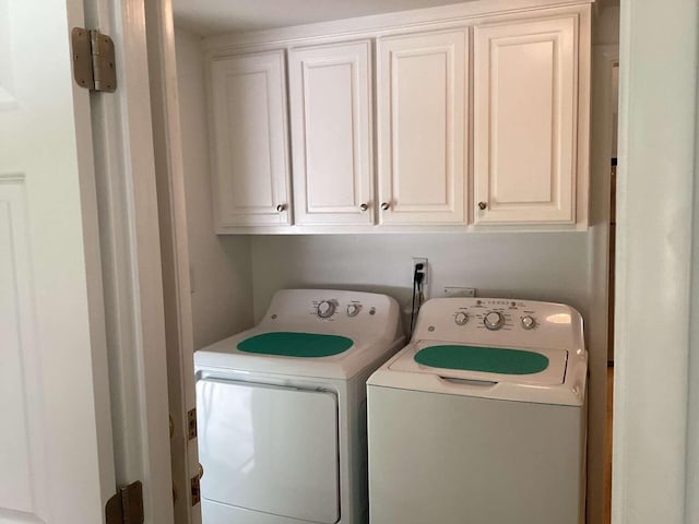 8 Saco Ave, Pocasset, MA 02559 - laundry area featuring washing machine and dryer and cabinet space