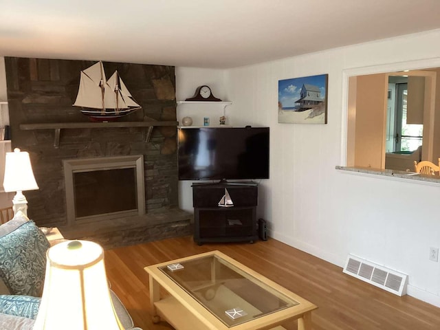 8 Saco Ave, Pocasset, MA 02559 - living area with wood finished floors and a fireplace