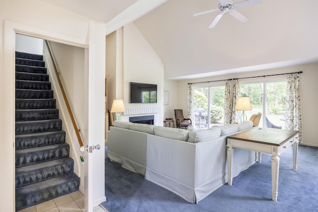 18 Juniper Cir, Brewster, MA 02631 - living area with stairs, high vaulted ceiling, carpet floors, a fireplace, and ceiling fan