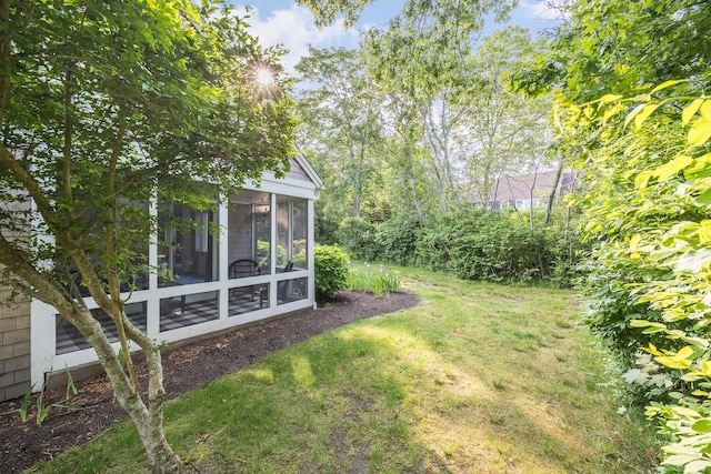 18 Juniper Cir, Brewster, MA 02631 - view of grassy yard featuring a sunroom
