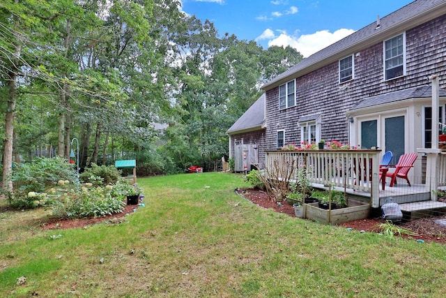 view of yard with a deck