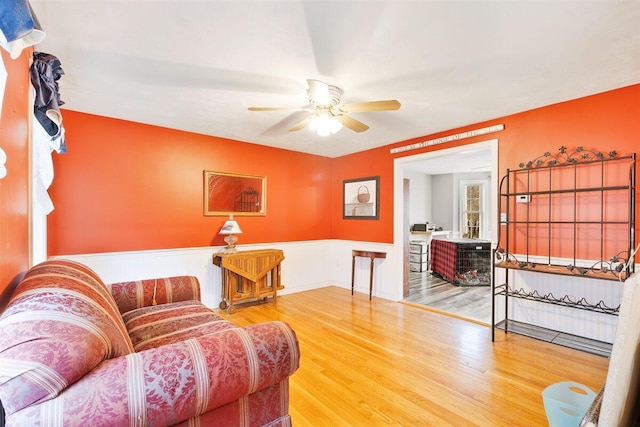 interior space with ceiling fan and hardwood / wood-style floors