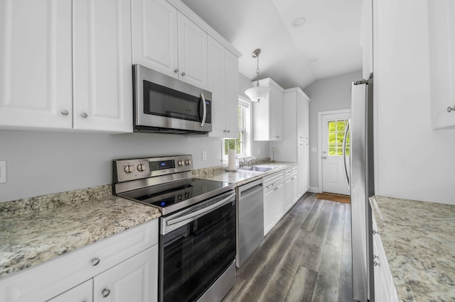 5 Whiffletree Cir, Sandwich, MA 02563 - kitchen with stainless steel appliances, a sink, dark wood finished floors, white cabinetry, and vaulted ceiling