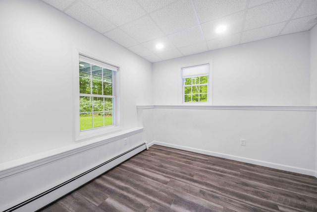5 Whiffletree Cir, Sandwich, MA 02563 - unfurnished room featuring a baseboard heating unit, healthy amount of natural light, dark wood-style floors, recessed lighting, and a drop ceiling