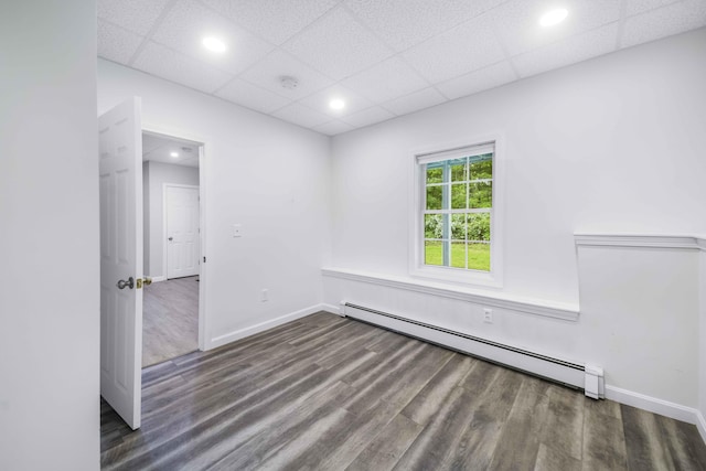 5 Whiffletree Cir, Sandwich, MA 02563 - empty room featuring baseboard heating, wood finished floors, baseboards, recessed lighting, and a paneled ceiling