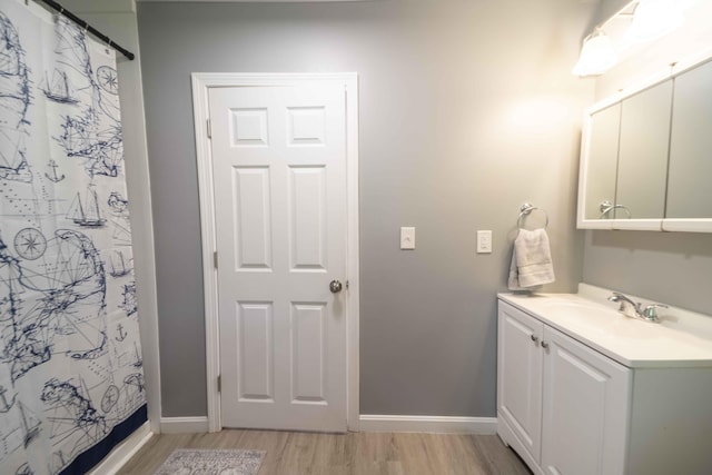 5 Whiffletree Cir, Sandwich, MA 02563 - bathroom featuring vanity, wood finished floors, baseboards, and curtained shower